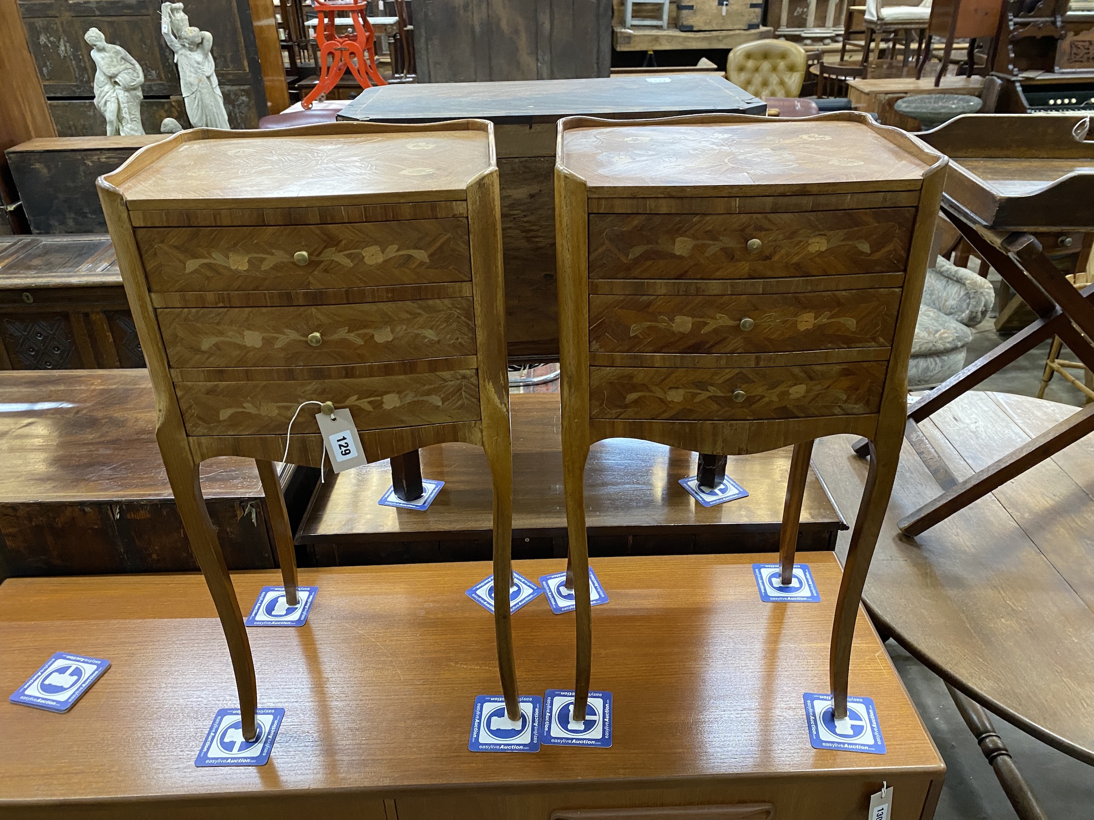 A pair of Louis XVI style marquetry inlaid kingwood bedside chests, width 38cm, depth 29cm, height 74cm